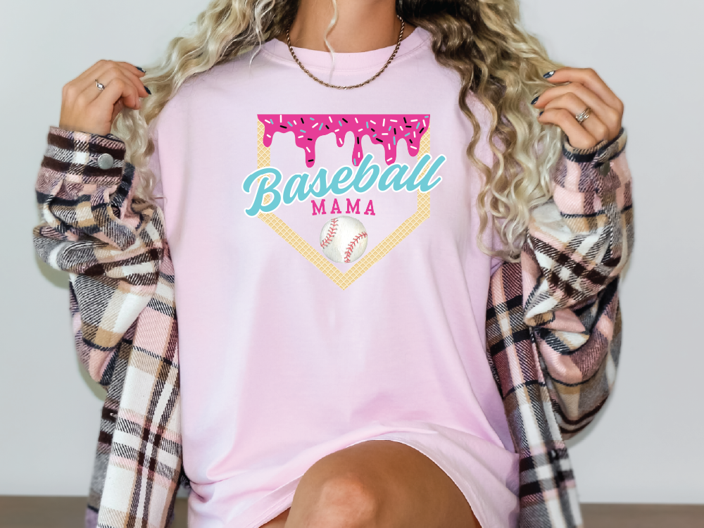 a woman wearing a pink baseball mama shirt
