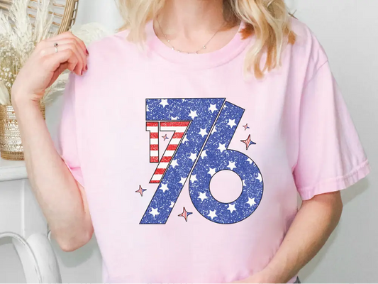 a woman wearing a pink shirt with the number seventy on it
