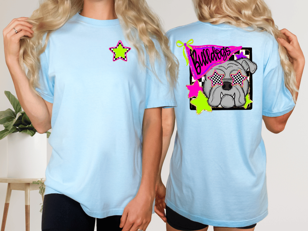 two women wearing light blue t-shirts with a graphic design on the back. The design features a bulldog wearing sunglasses and a star.