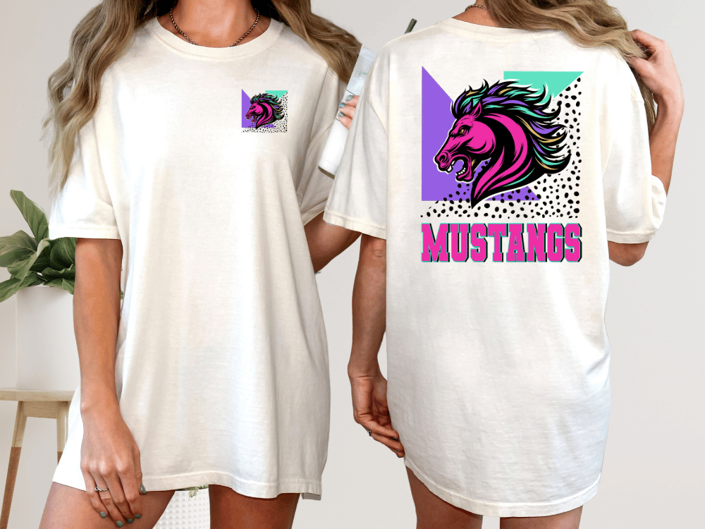 A white t-shirt with a graphic design on the back, featuring a stylized horse's head in pink and purple colors, along with the word "Mustangs" written in pink and purple text.