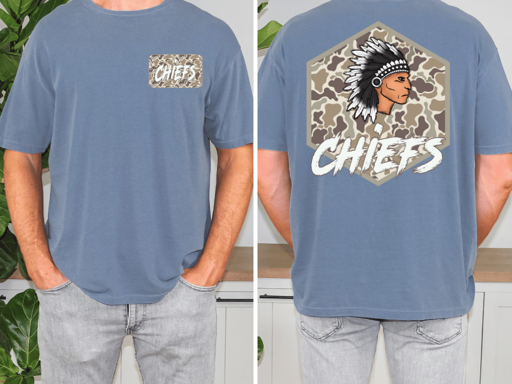 a man wearing a blue t-shirt with a graphic design on the back. The design features a Native American headdress and the word "CHIEFS" written below it.