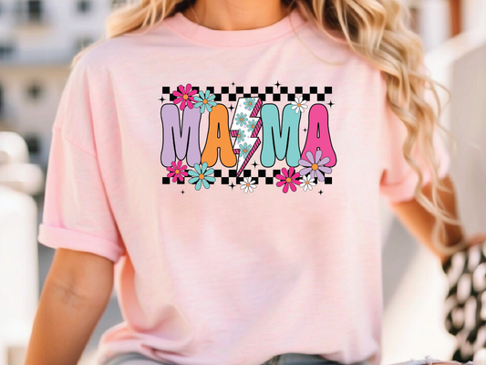 a woman wearing a pink shirt with the word ma ma on it