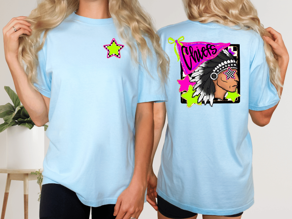 A woman wearing a light blue t-shirt with a graphic design on the back, including a Native American headdress and colorful stars.