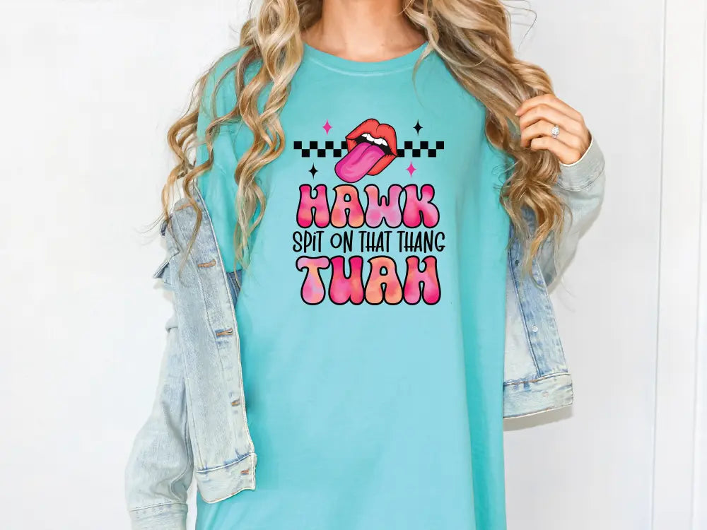 a woman wearing a t - shirt that says hark she's not that
