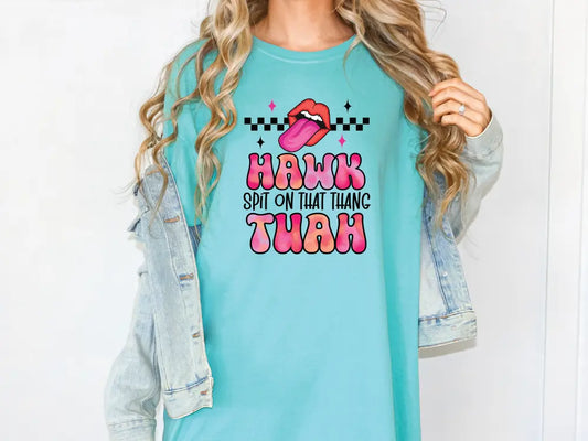 a woman wearing a t - shirt that says hark she's not that