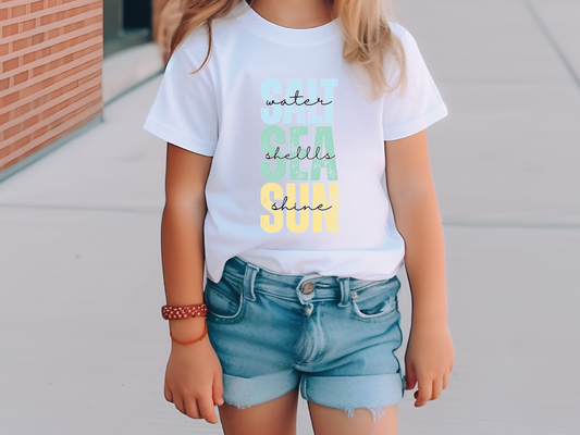 a little girl wearing a t - shirt that says eat, drink, and dance