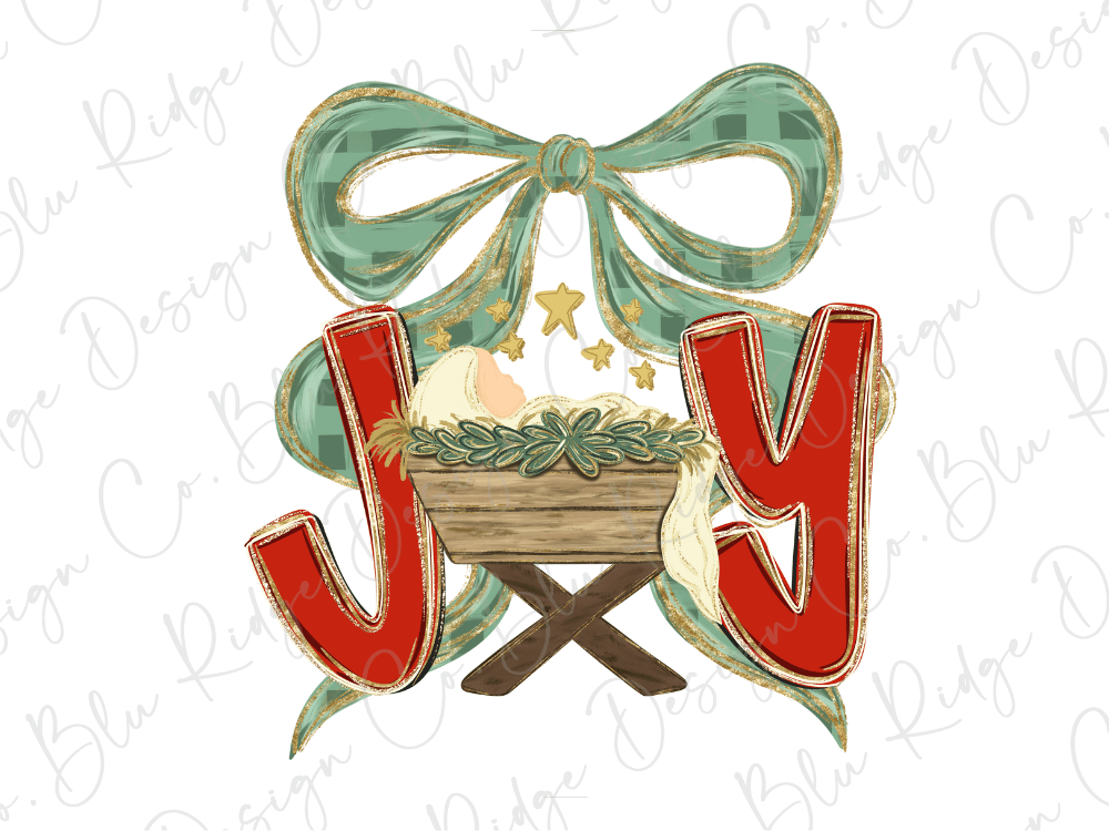 a nativity scene with a baby in a wooden basket, surrounded by a green bow and red letters spelling "Joy".