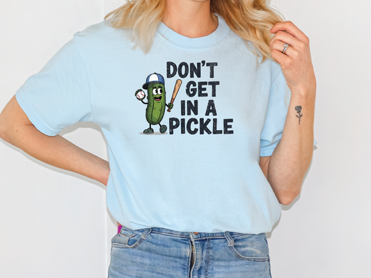 a woman wearing a don't get in a pickle t - shirt