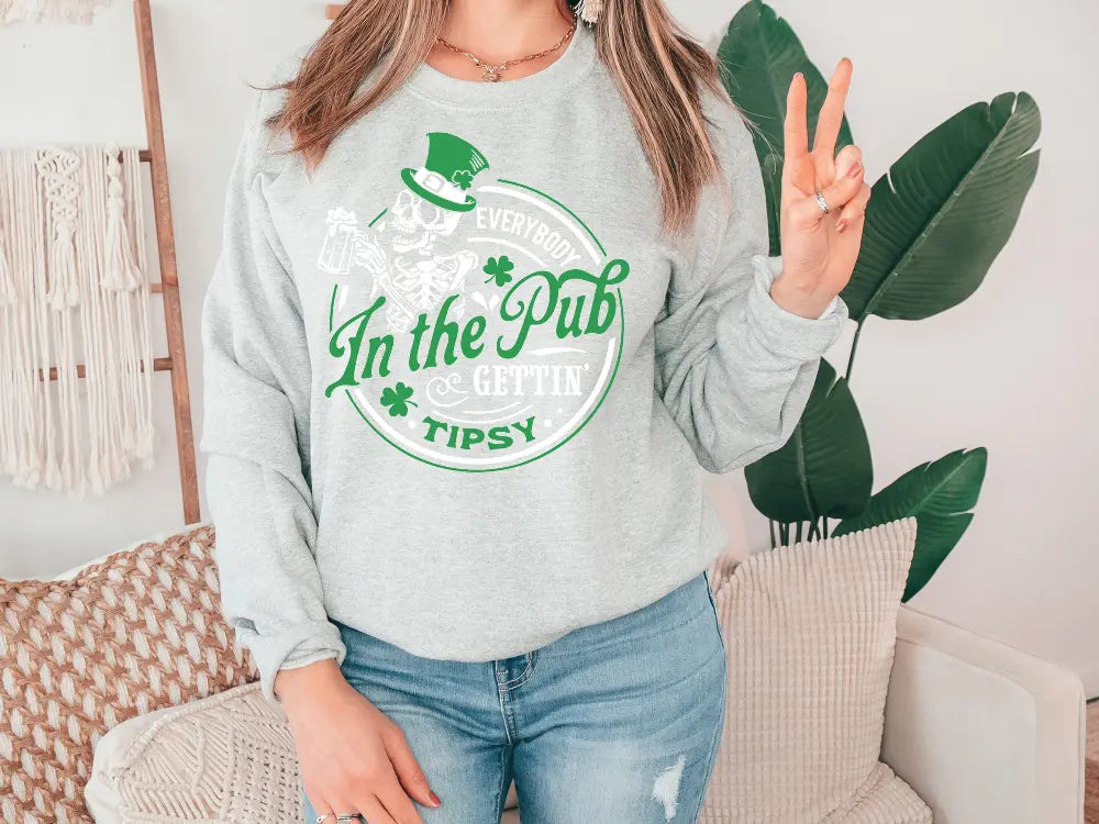 a woman wearing a st patrick's day sweatshirt