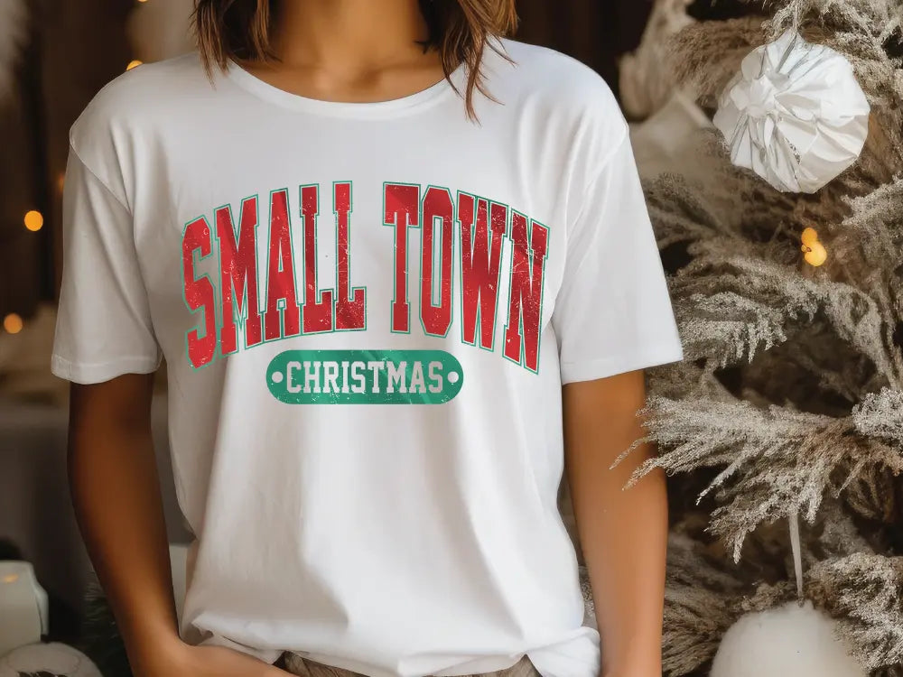 a woman standing in front of a christmas tree