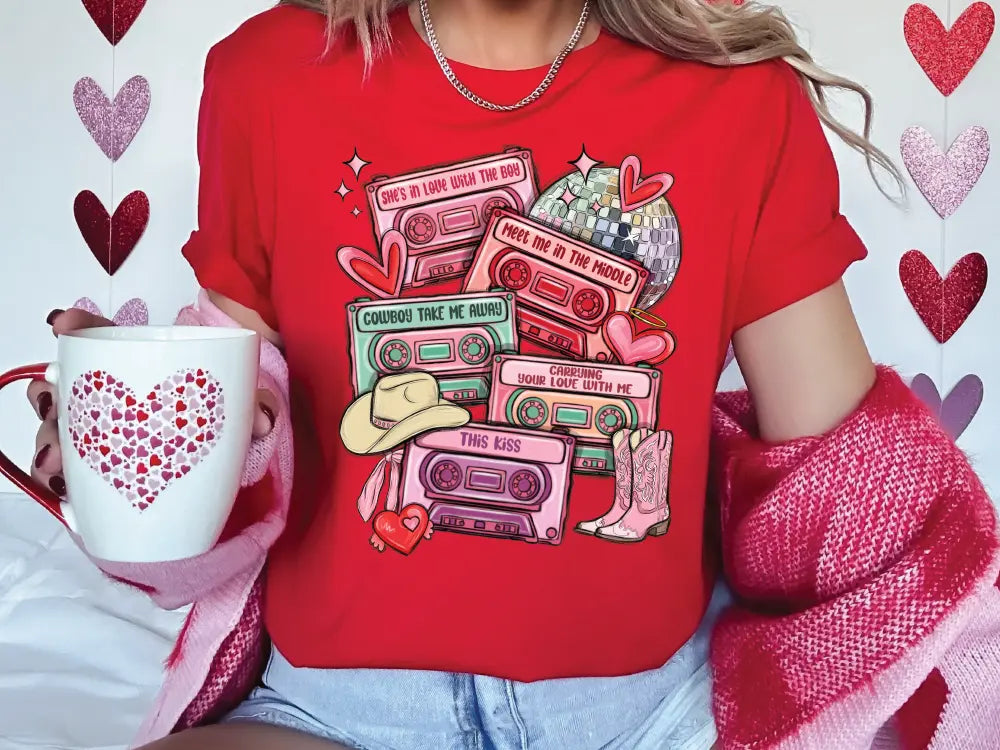a woman in a red shirt holding a coffee mug