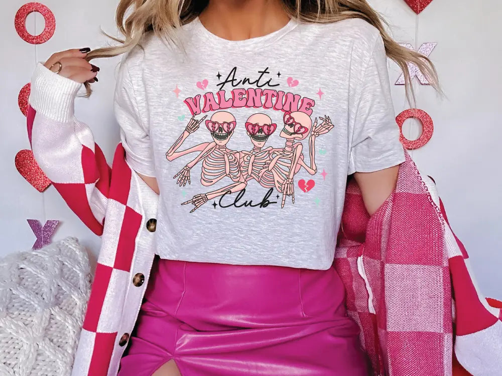a woman in a white shirt and pink skirt