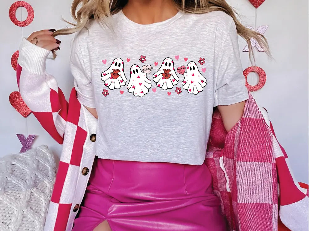 a woman in a white shirt and pink skirt