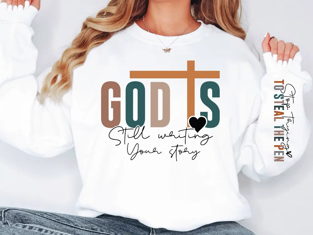 a woman wearing a white sweatshirt with the words god's written on it