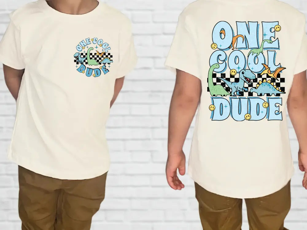 a man wearing a white t - shirt that says one cool dude