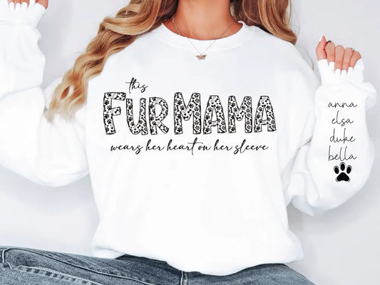 a woman wearing a white shirt that says, the fur mama
