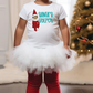 a little girl wearing a santa clause outfit