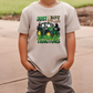 a young boy wearing a t - shirt that says just a boy who loves tractors