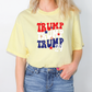 a woman wearing a yellow shirt with the words trump on it