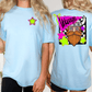 two different views of a woman wearing a light blue t-shirt with a graphic design on the back.