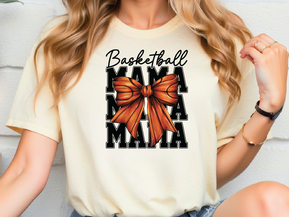 a woman wearing a t - shirt that says basketball mama