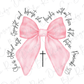 a pink bow with a cross on it