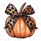 a pumpkin with a leopard print bow on it