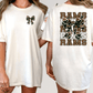 two different views of a white t-shirt with a bow and the word "RAMS" printed on the back.
