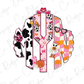 The image is a monogram made up of various colorful and whimsical elements, including a cow, a ghost, a pumpkin, and a cowboy hat.
