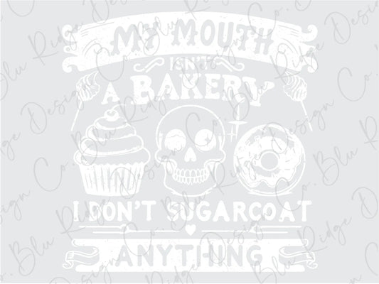 a skull and a cupcake with the words, my mouth is a bakery don