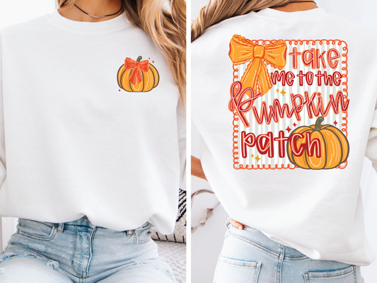 A white sweatshirt with a pumpkin patch design and text on the back.