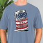 a man wearing a blue shirt with a can of beer printed on it