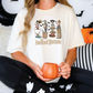 a woman sitting on a bed holding a mug