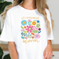 a woman wearing a t - shirt that says let kindness bloom