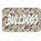 A camouflage-patterned rectangular object with the word "Bulldogs" written in white text on it.