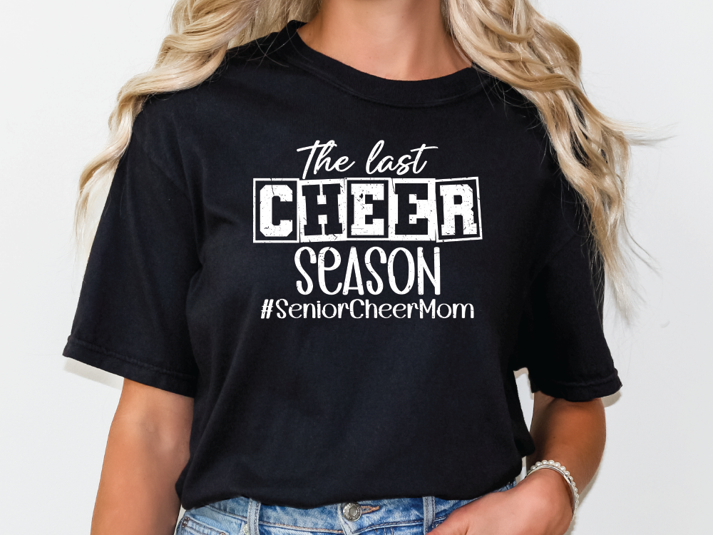 a woman wearing a black shirt that says the last cheer season