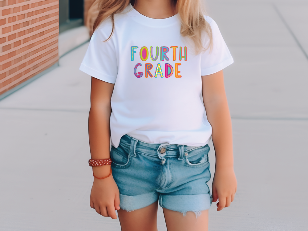 a young girl wearing a fourth grade t - shirt