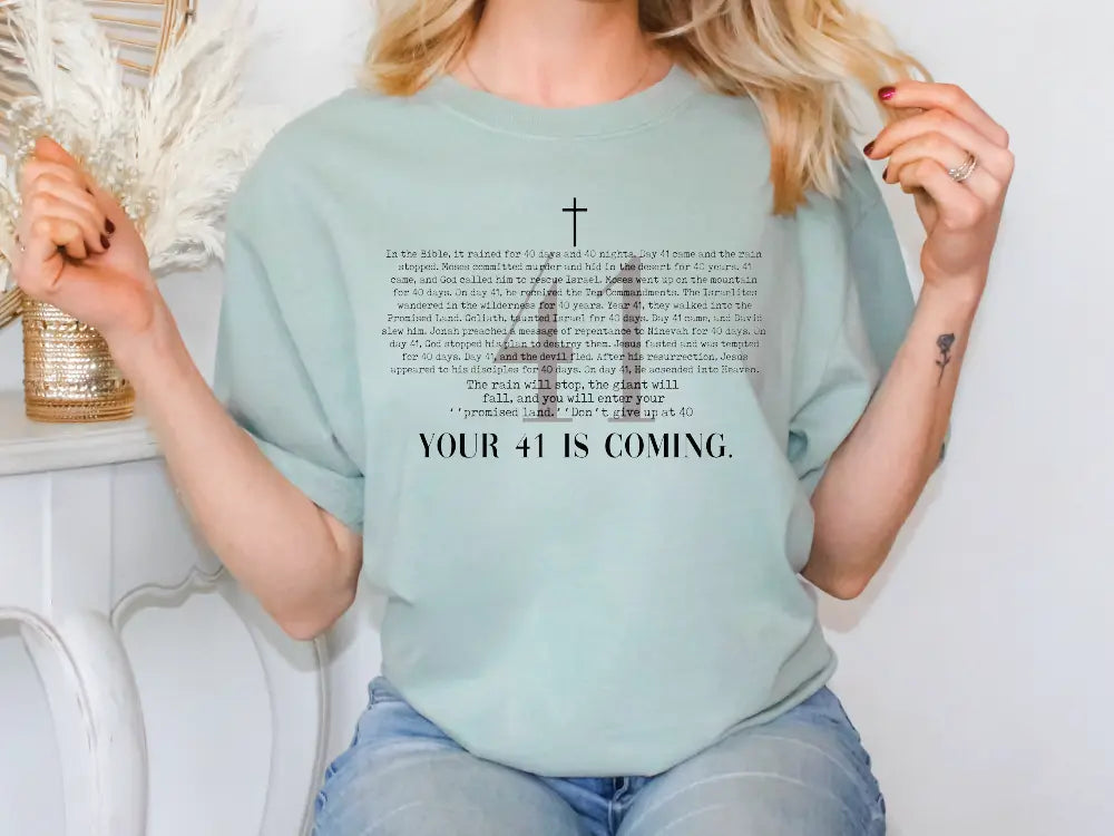 a woman wearing a t - shirt that says your 41 is coming