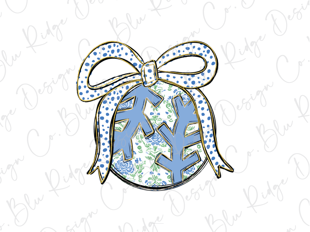 A blue and white polka dot bow is tied around a Christmas ornament with a floral pattern.