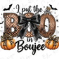 a Halloween-themed design with the text "I put the BOO in BOojee" surrounded by decorative elements such as leopard print pumpkins, a bow, and bats.