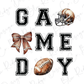 a football helmet and bow with the words game day on it