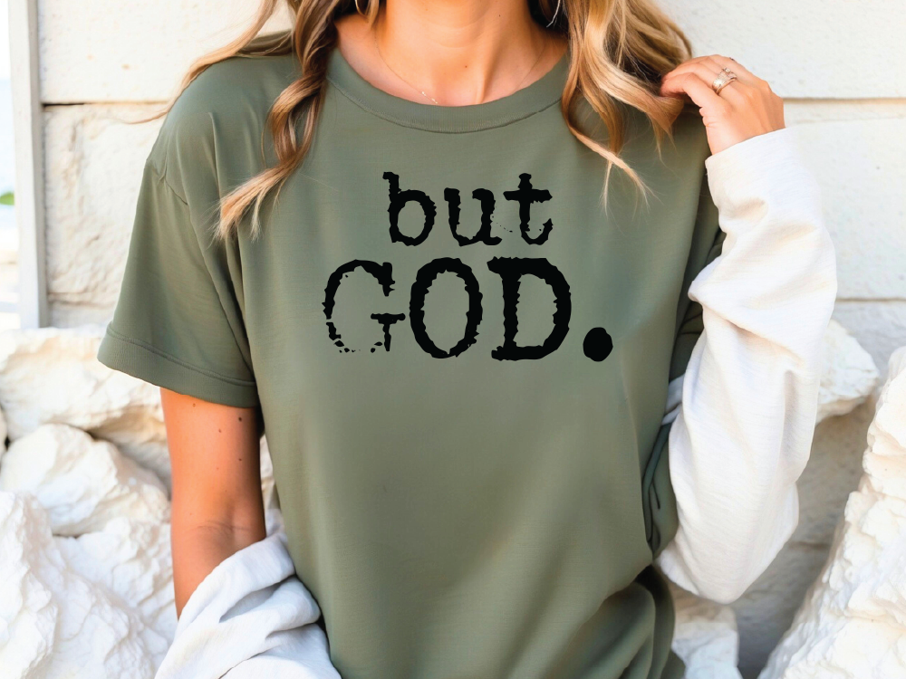 a woman wearing a shirt that says, but god