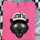 A pink t-shirt with a graphic design of a black panther wearing a baseball cap and sunglasses, along with the text "LET'S GO".