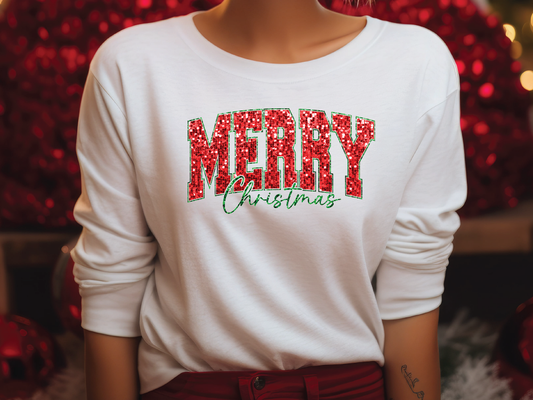 a close up of a person wearing a merry christmas shirt