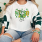 a woman sitting on a couch wearing a st patrick's day shirt