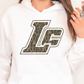 a woman wearing a white hoodie with the letter l on it