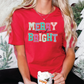 a woman wearing a merry and bright shirt