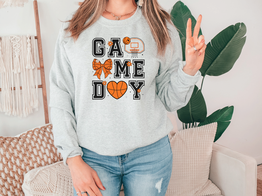 a woman wearing a sweatshirt that says game day