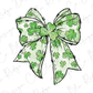 a green and white bow with shamrocks on it