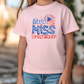 a little girl wearing a pink shirt that says little miss firecracker